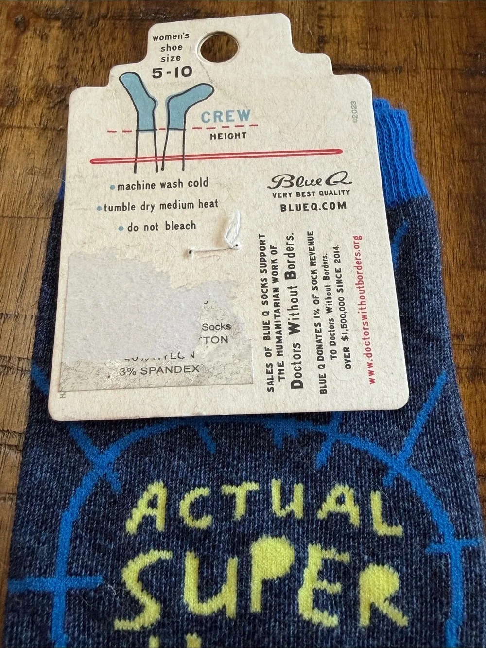 Blue Q Navy Crew Socks with Yellow 'Actual Super Hero' Text